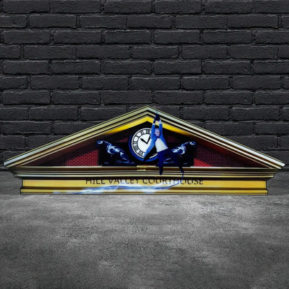 Decorative clock with 'Hill Valley Courthouse' text against a brick wall.