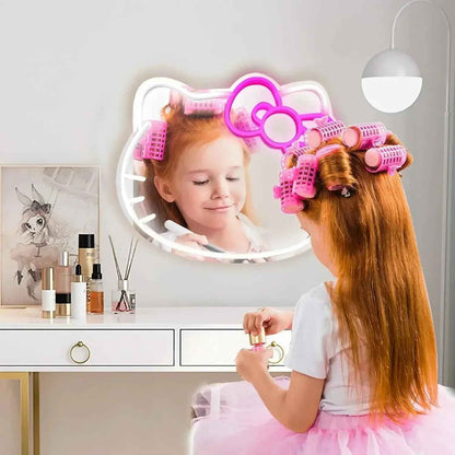 Girl with pink hair rollers using Hello Kitty LED vanity mirror for makeup play