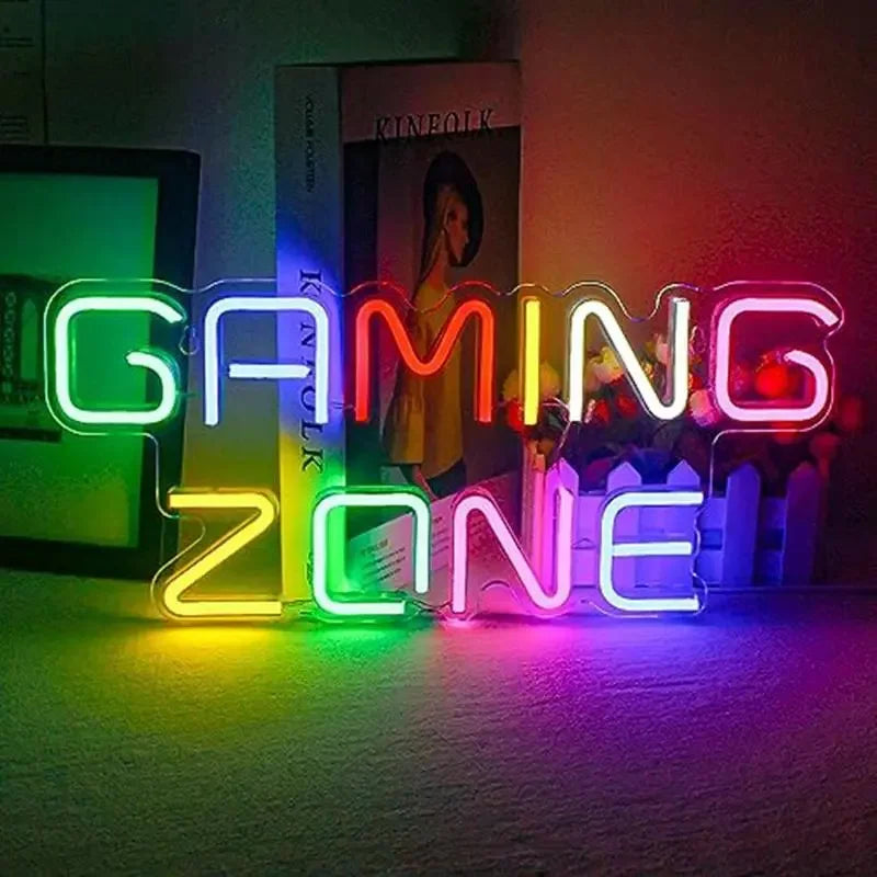 Colorful neon 'GAMING ZONE' sign for game room decor, glowing with rainbow lights