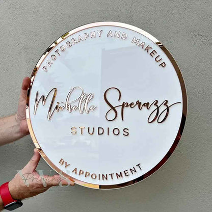 Custom round acrylic sign with rose gold lettering for Michelle Sperazz Studios, photography and makeup by appointment