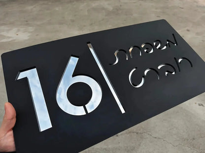 Custom metal house number 16 with mirrored cutout design, modern address plaque